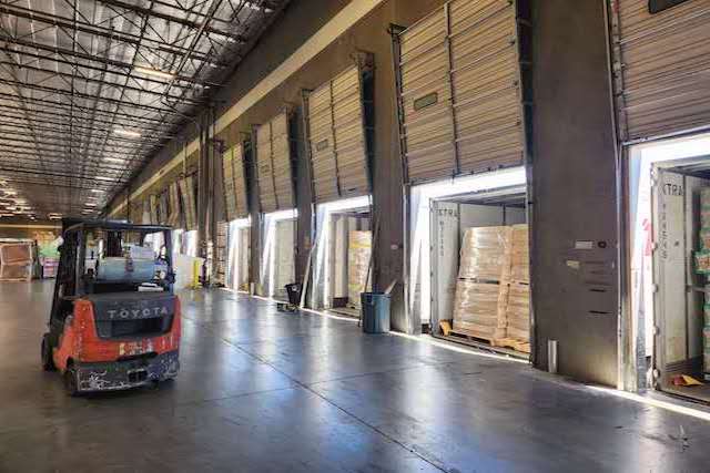 Image of person working in the warehouse.